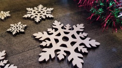 500 Pcs 3-1/2 Unfinished wood snowflakes and other Christmas cutouts  available at wholesale pricing. In stock and ready for all your Christmas  and Holiday craft needs. 