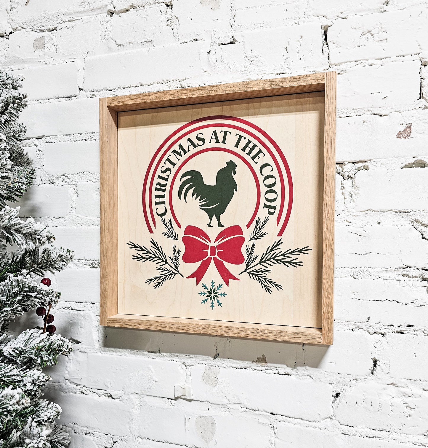 christmas at the coop holiday wooden sign wall decor hanging with rooster / chicken / hen in middle and bow on bottom