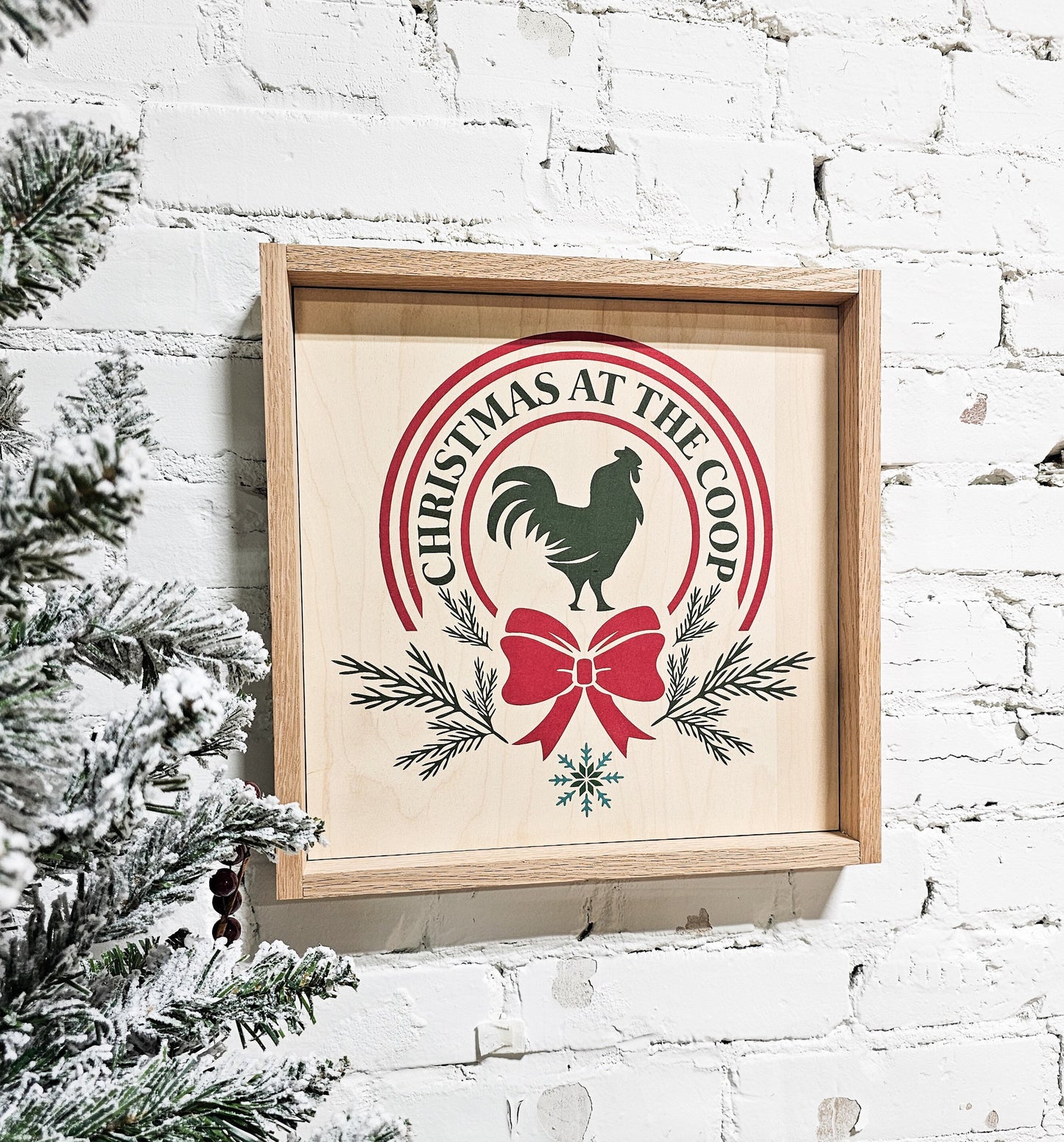 christmas at the coop holiday wooden sign wall decor hanging with rooster / chicken / hen in middle and bow on bottom