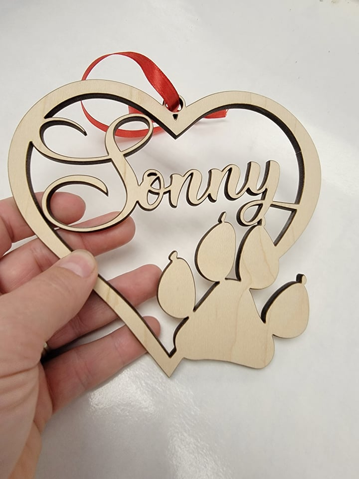Personalized Christmas ornament for Pets. Heart shaped Wood Cut Out, with paw print & pet's name