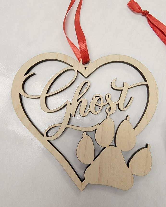 Personalized Christmas ornament for Pets. Heart shaped Wood Cut Out, with paw print & pet's name