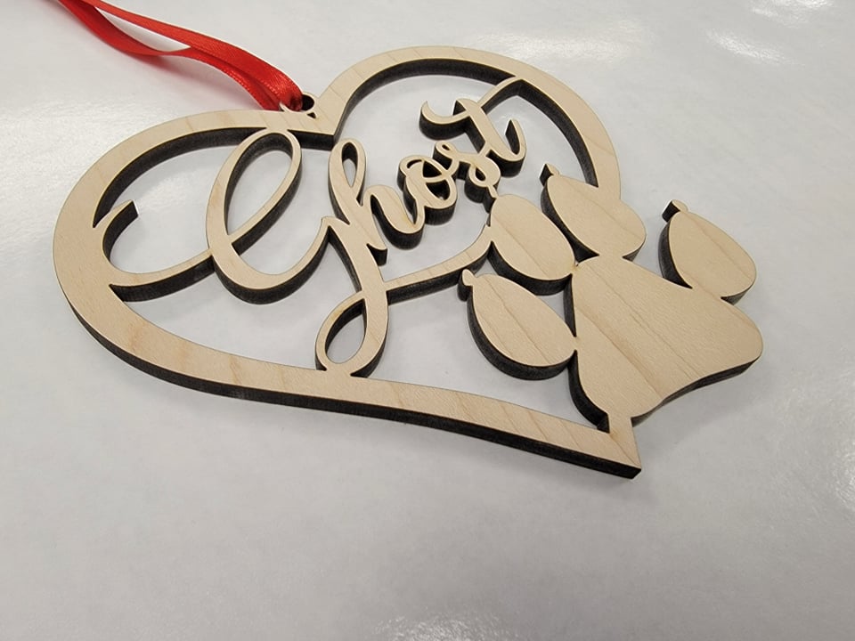 Personalized Christmas ornament for Pets. Heart shaped Wood Cut Out, with paw print & pet's name