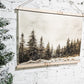 winter landscape scene painting like hanging framed canvas for wall decor, pictured on the sign is wintery pine trees in a snowy environment with a vintage moody look