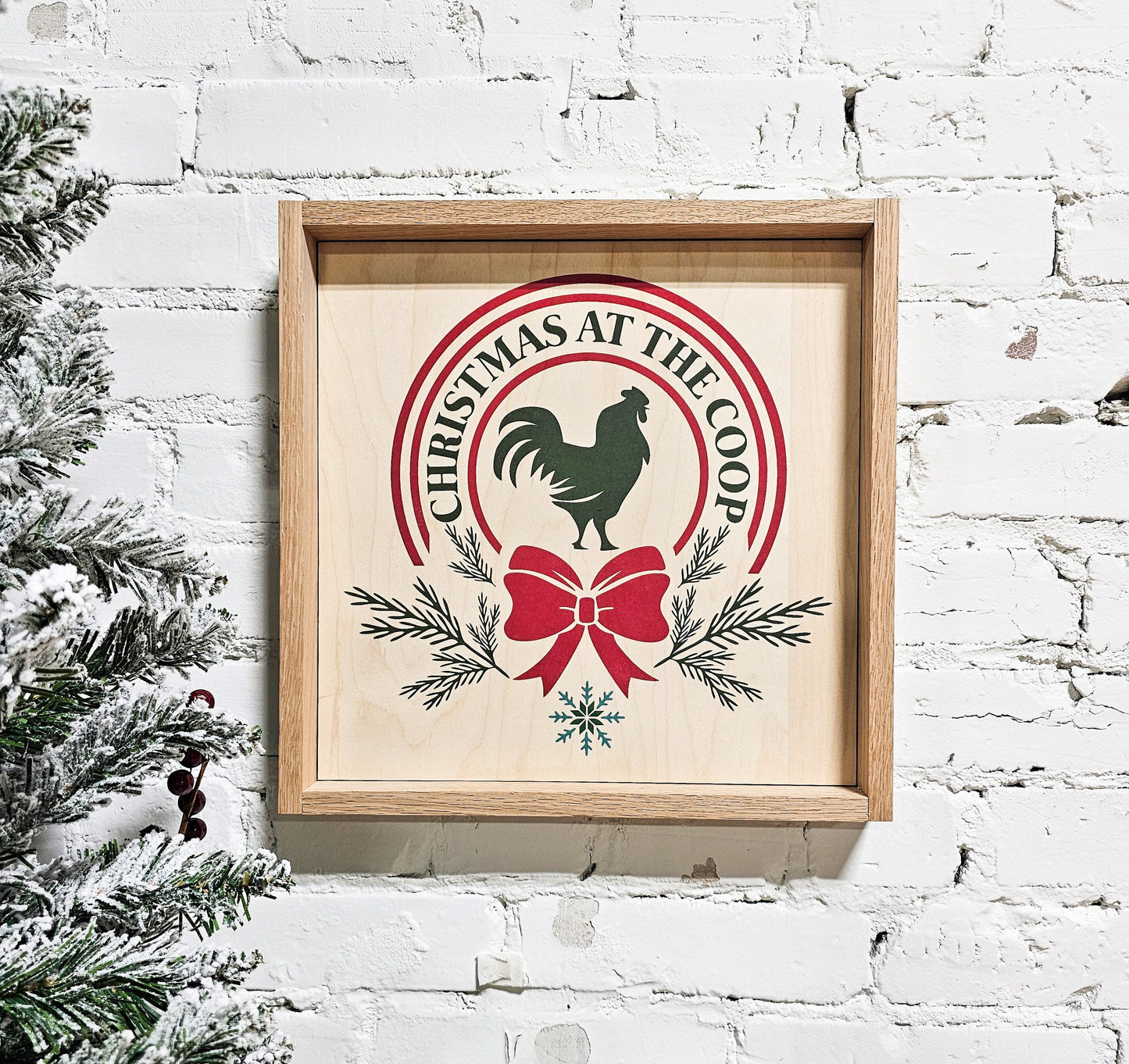 christmas at the coop holiday wooden sign wall decor hanging with rooster / chicken / hen in middle and bow on bottom